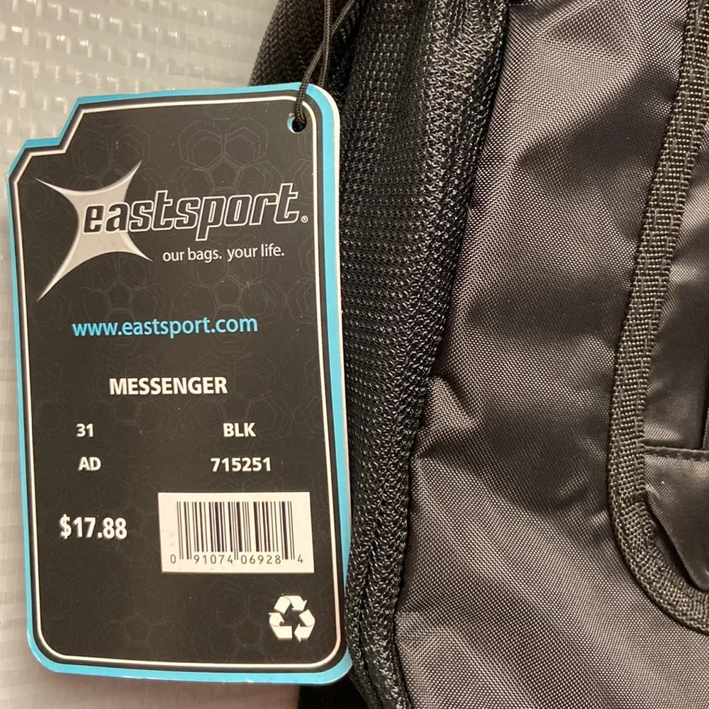 Messenger bag features laptop sleeve- multi- function pockets— Adjustable strap